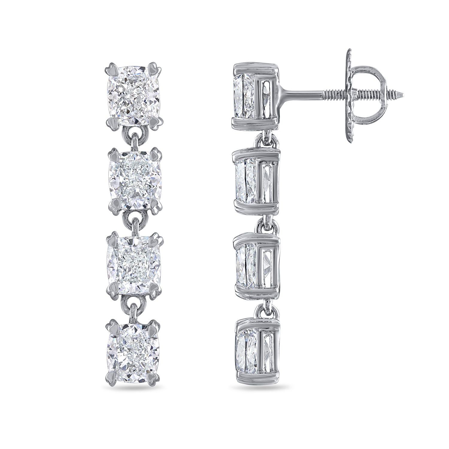 These exquisite 18k white gold earrings are a perfect blend of elegance and sophistication, featuring a total of 5.6 carats of natural princess cut brilliant diamonds. Each diamond is GIA certified, ensuring the highest quality with D color and