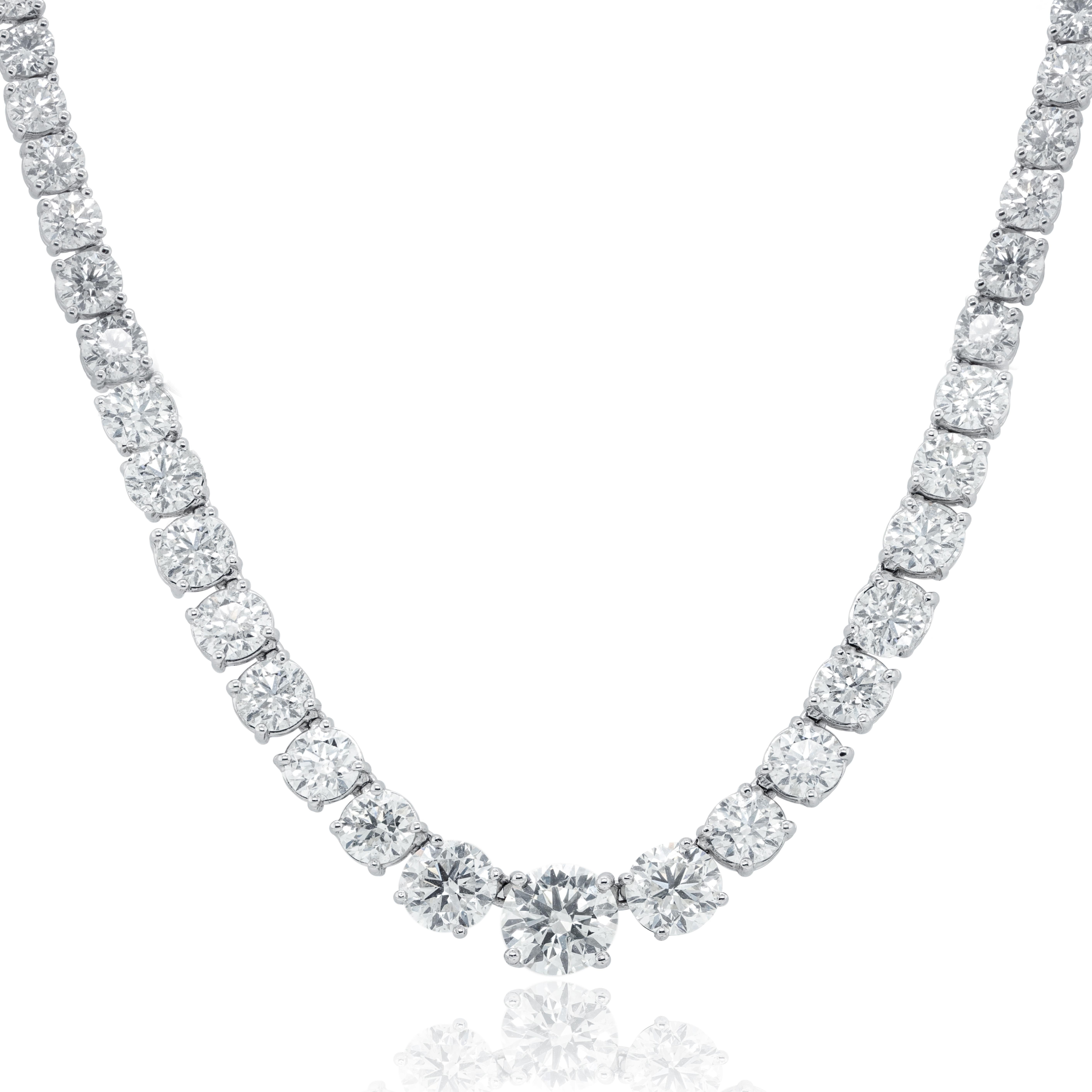 18KT white gold graduated four prong tennis necklace, features 31.00 cts of round diamonds. Center stone is 2.40 cts round and 3.12 cts next 2 stones.

This product comes with a certificate of appraisal
This product will be packaged in a custom