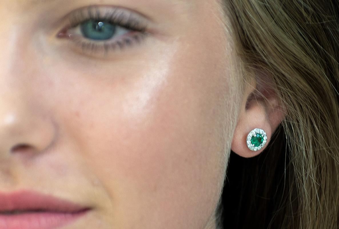 Featuring 18k white gold halo emerald and diamond earrings 
Measuring 0.35