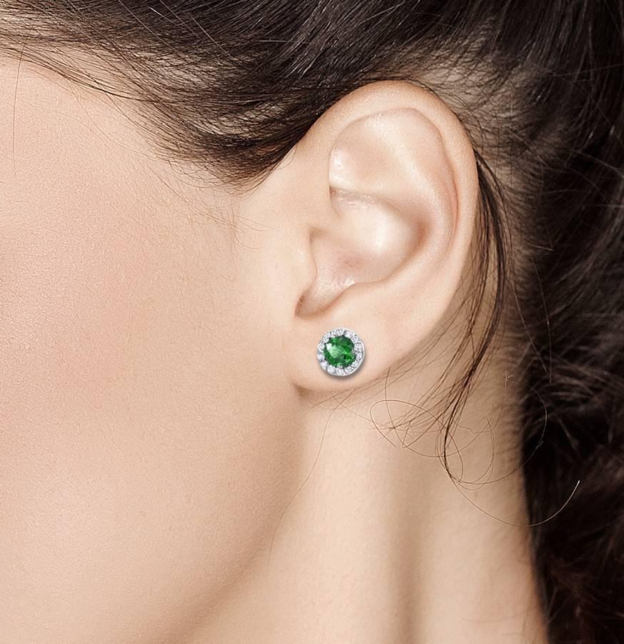 Contemporary White Gold Halo Emerald Diamond Earrings Weighing 1.25 Carat