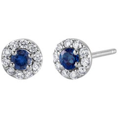 White Gold Halo Sapphire Diamond Earrings Weighing 0.60 Carat