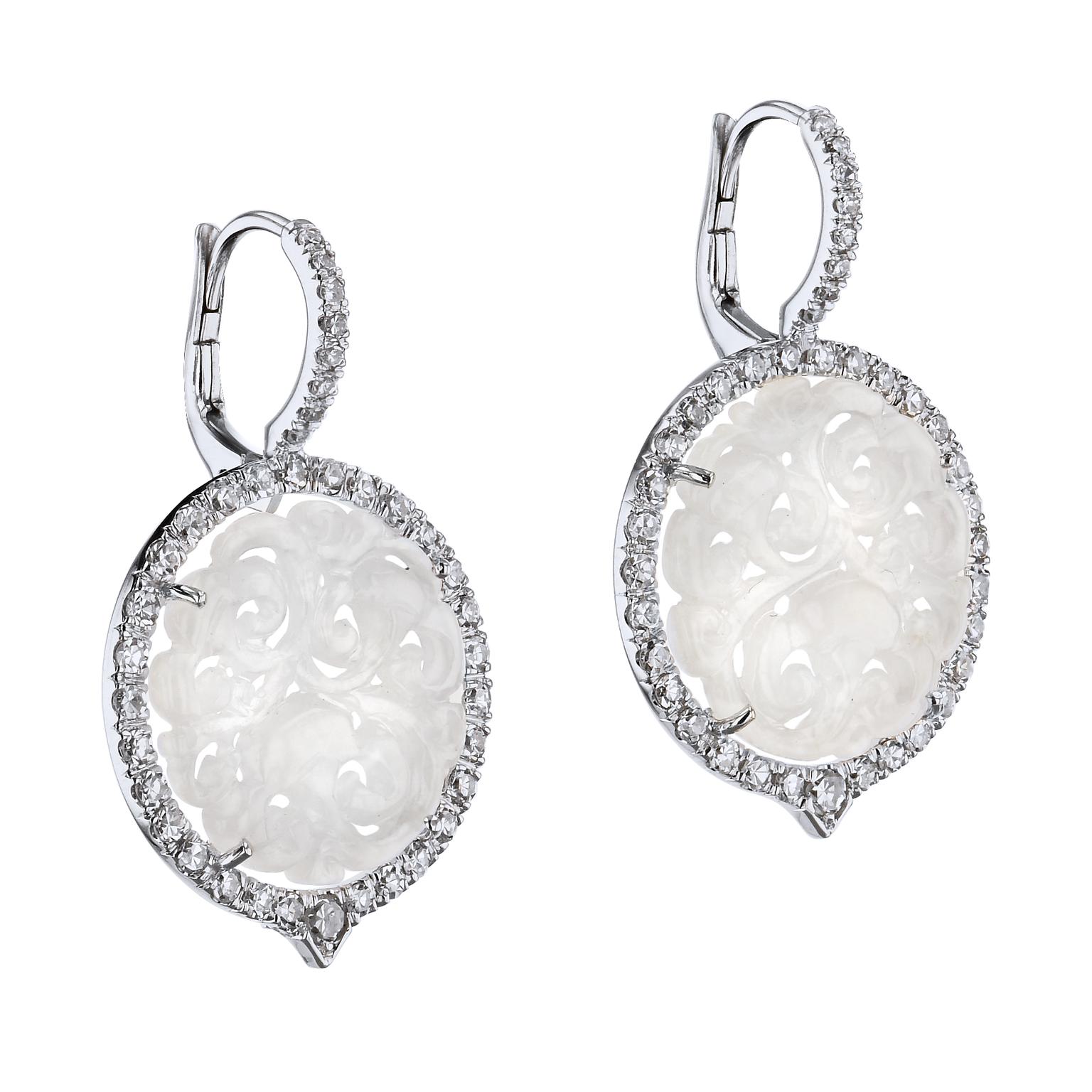 Decorated in 18 karat white gold and pave diamonds of 1.12 carats in total weight (G/H VS), these handmade 17mm Grade A No Treatment Icy Jade earrings are the perfect pieces to brighten your wardrobe.