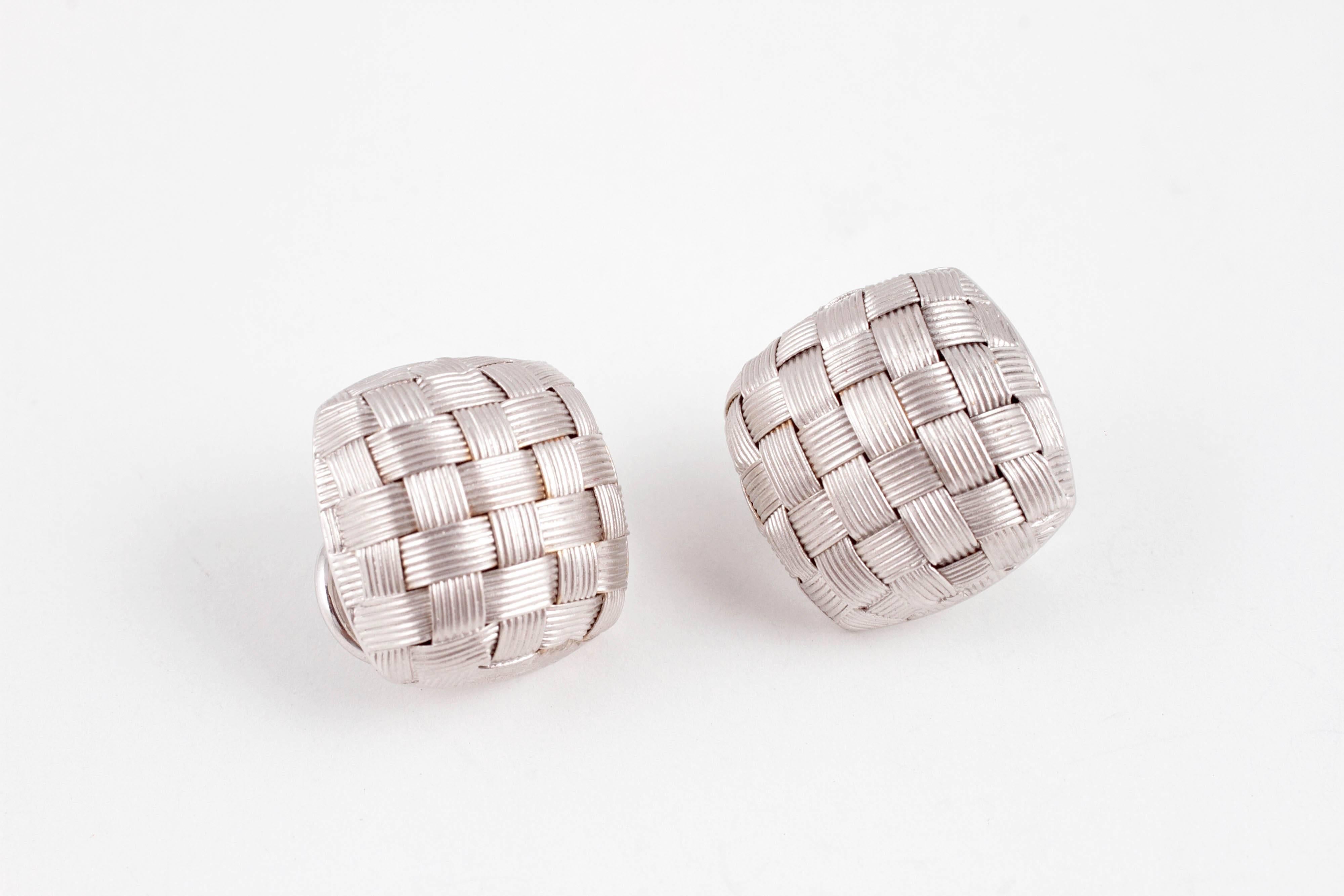Measuring 15.00 mm x 15.00 mm, secured with a pierced/clip back, these lovely 18 karat white gold, Italian earrings are a must for every jewelry box!