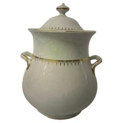 Barattolo bianco e oro con coperchio