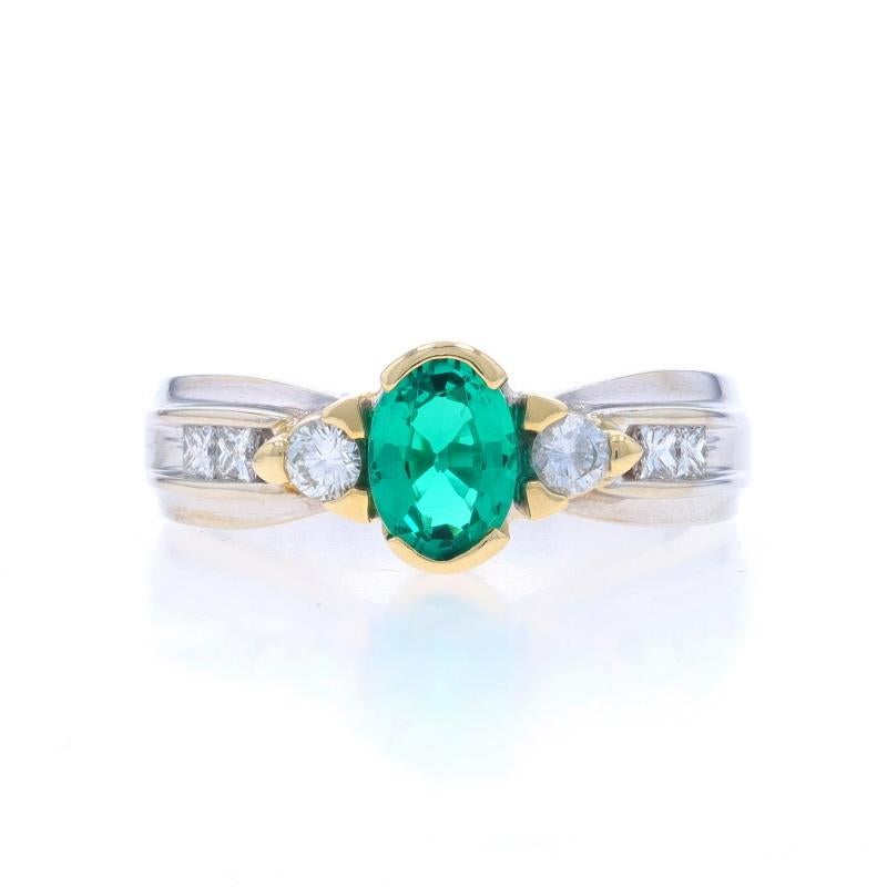 Size: 6
Sizing Fee: Up 1/2 a size for $40 or Down 1/2 a size for $40

Metal Content: 14k White Gold & 14k Yellow Gold

Stone Information

Synthetic Emerald
Carat(s): .85ct
Cut: Oval
Color: Green

Natural Diamonds
Carat(s): .32ctw
Cut: Round