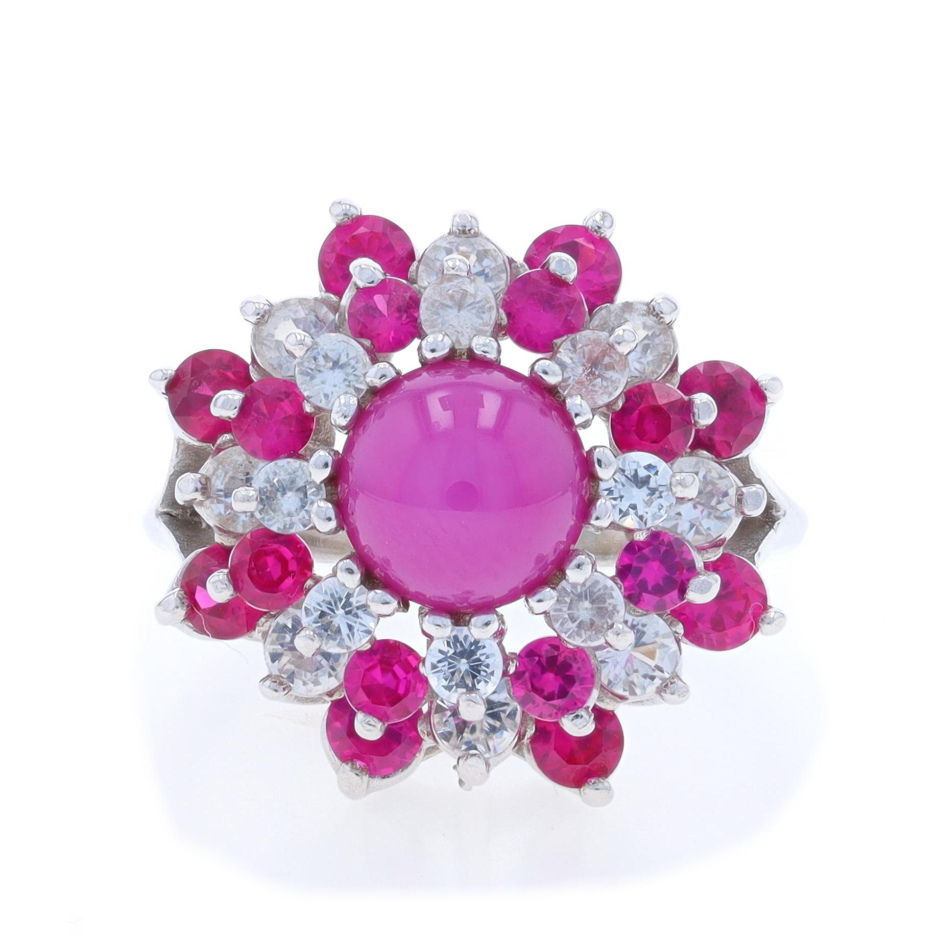 Size: 6 1/2
Sizing Fee: Up 2 1/2 sizes for $35 or Down 1 size for $35

Metal Content: 10k White Gold

Stone Information
Synthetic Star Ruby
Carat(s): 1.60ct
Cut: Round Cabochon
Color: Purplish Pink

Synthetic Rubies
Carat(s): 1.68ctw
Cut: