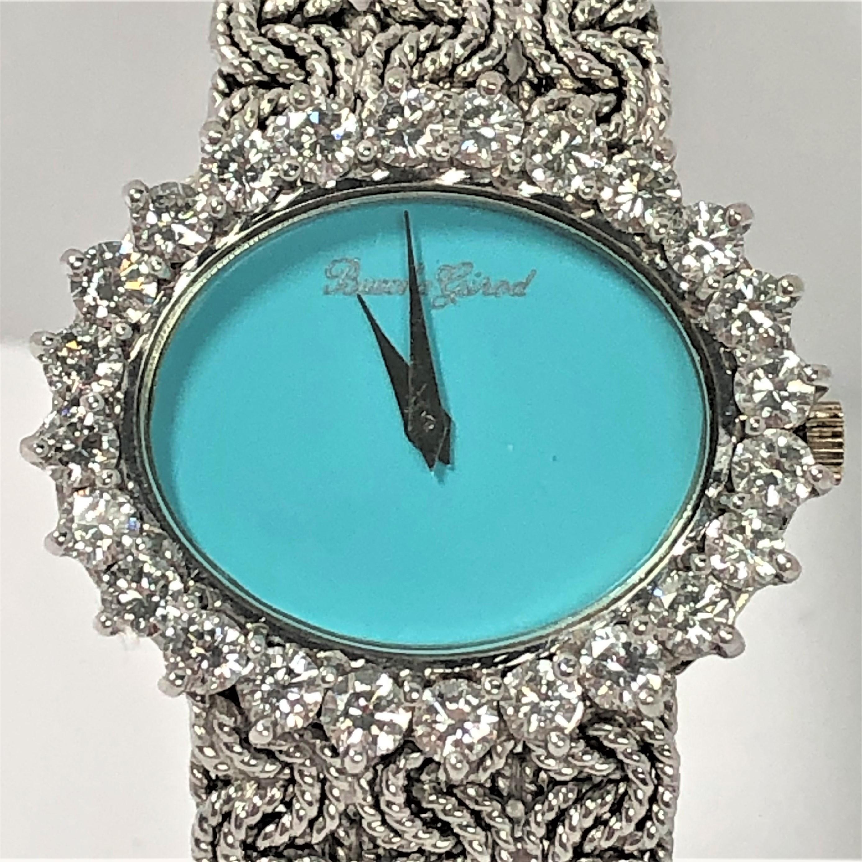 This outstanding 18K White Gold Ladies Bueche Girod Watch has a
horizontal turquoise oval dial surrounded by 24 round brilliant cut
diamonds weighing an approximate total of 2.35CT of overall G Color
and VS1 Clarity. The oval diamond bezel measures