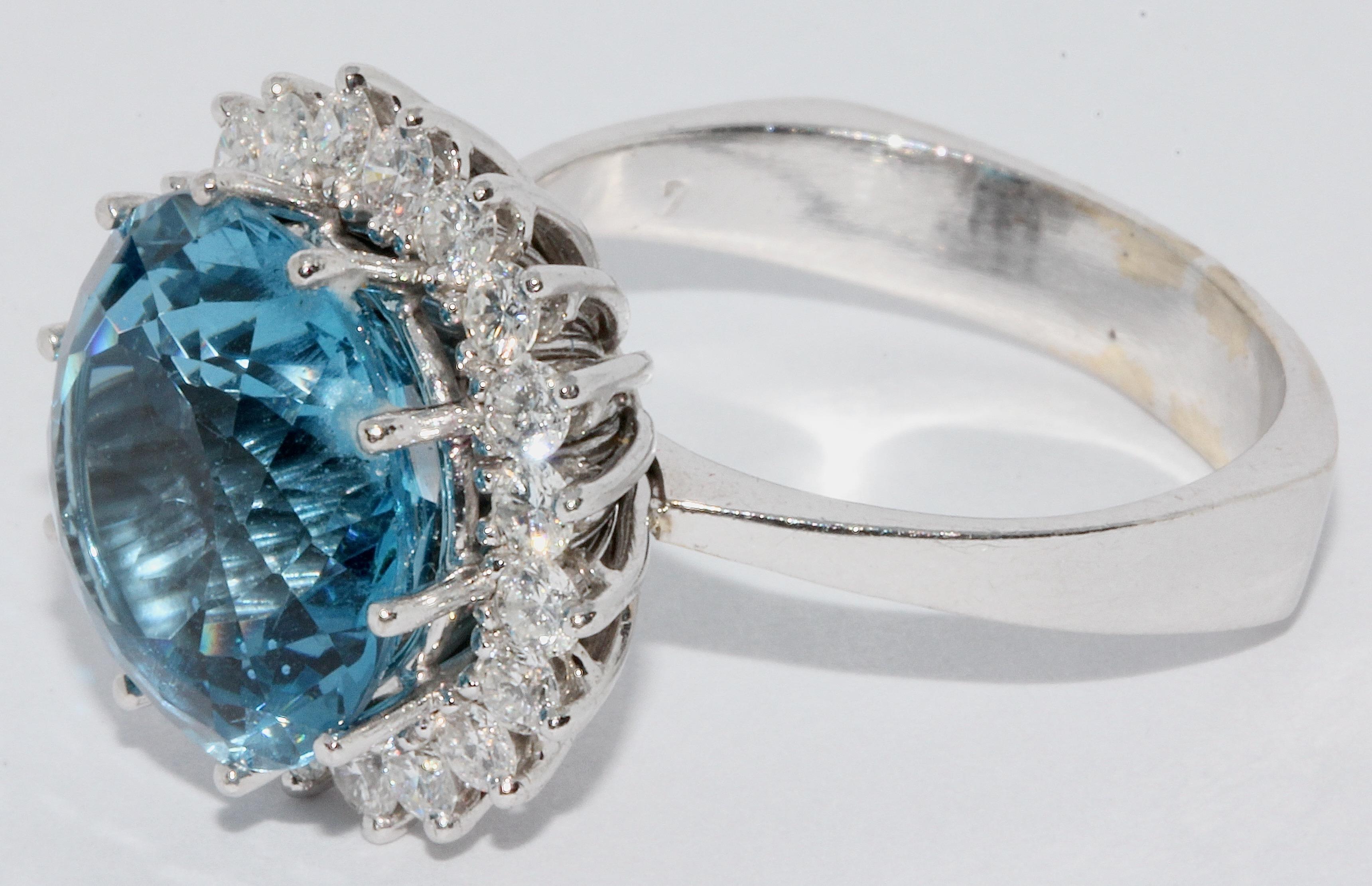 Modern White Gold Ladies Ring with Large, Faceted Blue Topaz and Diamonds For Sale