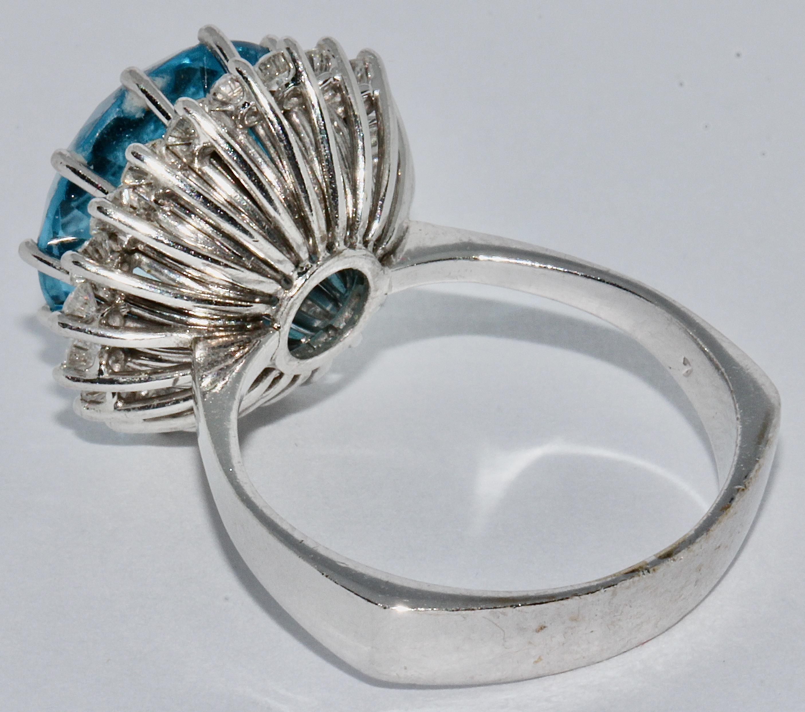 Round Cut White Gold Ladies Ring with Large, Faceted Blue Topaz and Diamonds For Sale