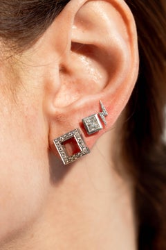 White gold lighting bolt with diamonds earrings