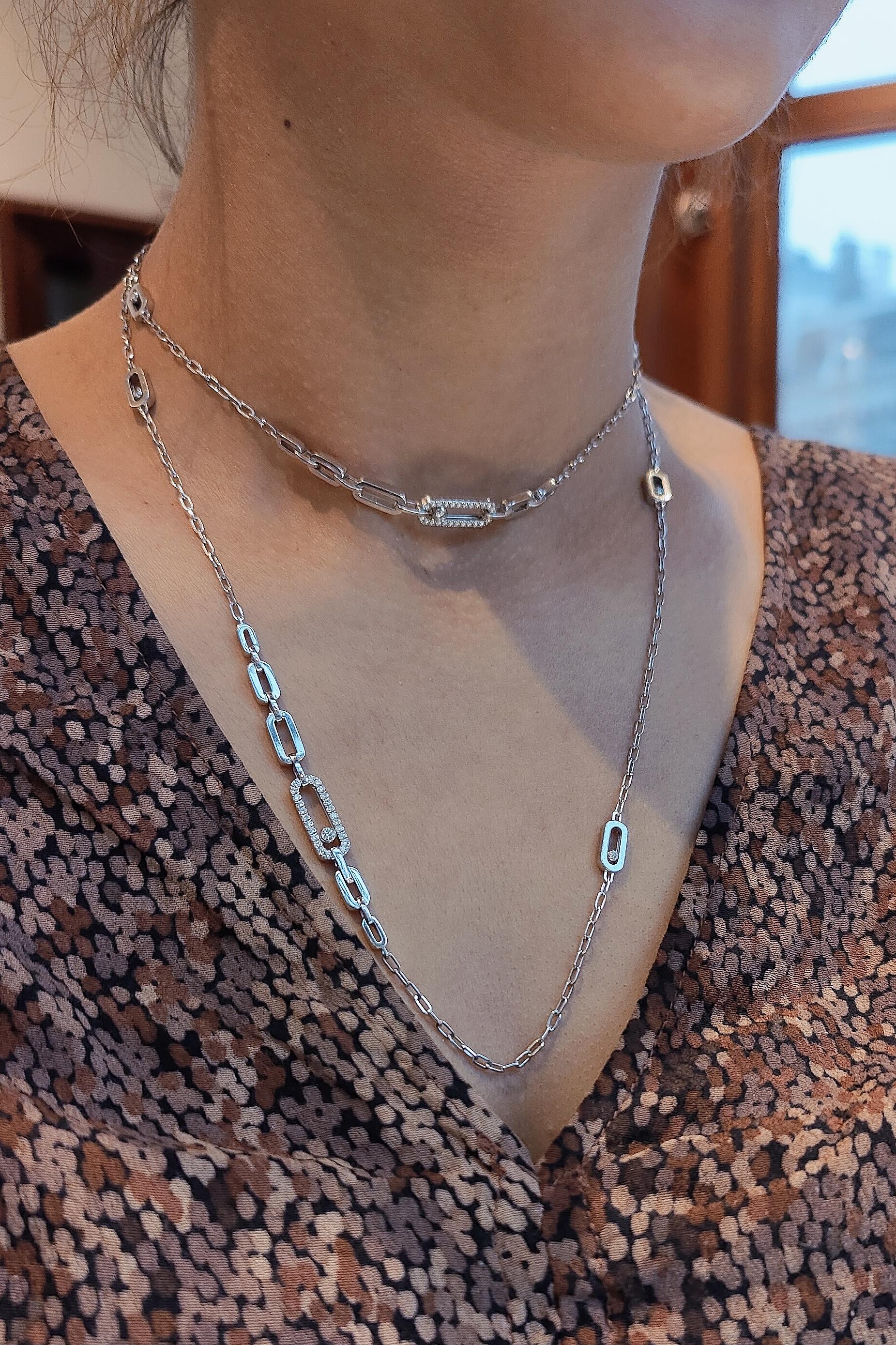 This handmade 18 karat white gold long length diamond necklace features a series of pavé or non-pavé elements. On some elements the diamonds move. And thanks to its delicately concealed clasp, this Move Uno luxury necklace can be worn with one or
