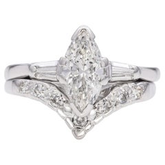 White Gold Marquise Cut Diamond Engagement Ring With Matching V Shape Band