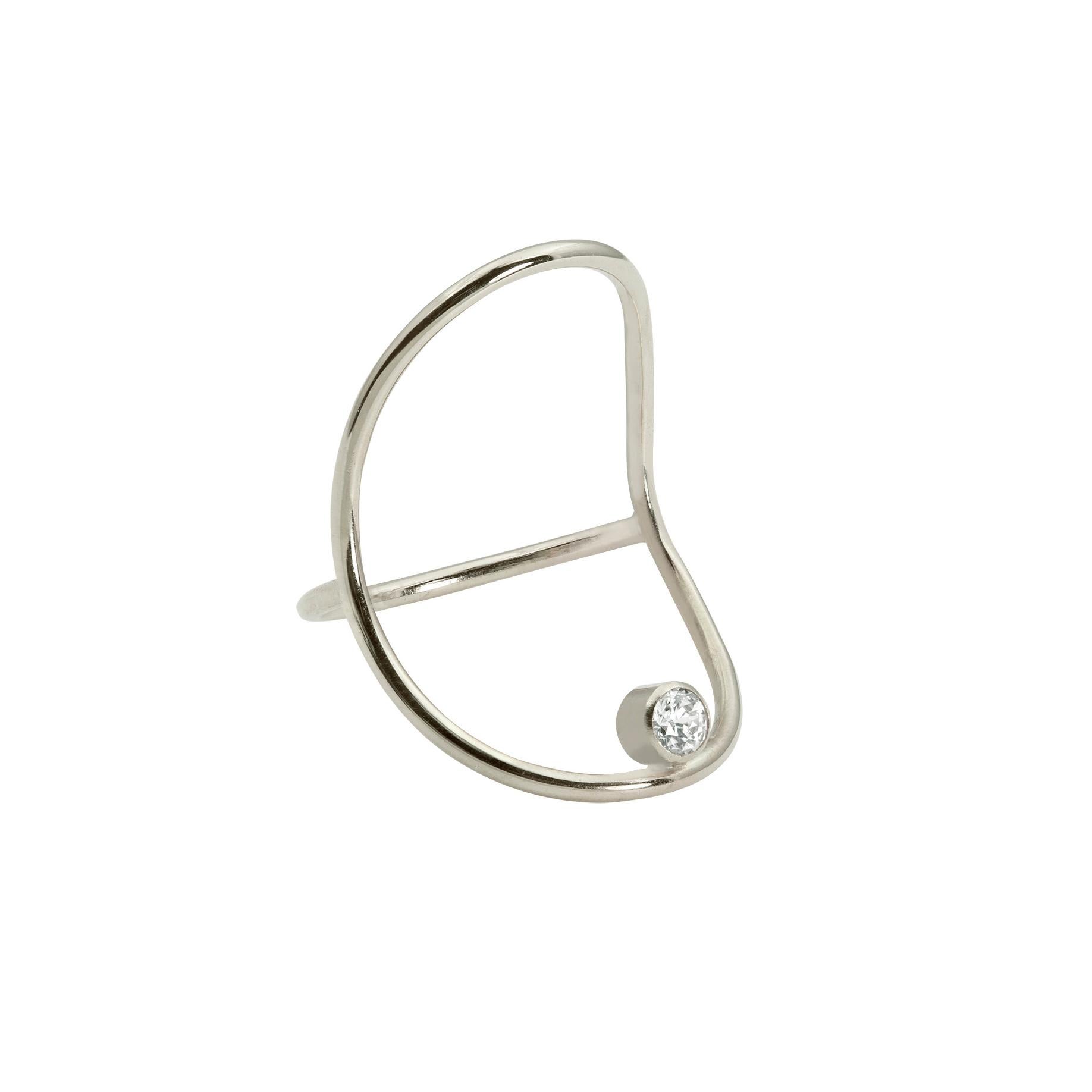 An elegant hand-formed solid 14k gold oval holds a brilliant white .10ct diamond (3mm) that seems to float on the finger.  It's bold and delicate at the same time - minimal with a bit of surrealist magic, and it's streamlined design makes it very