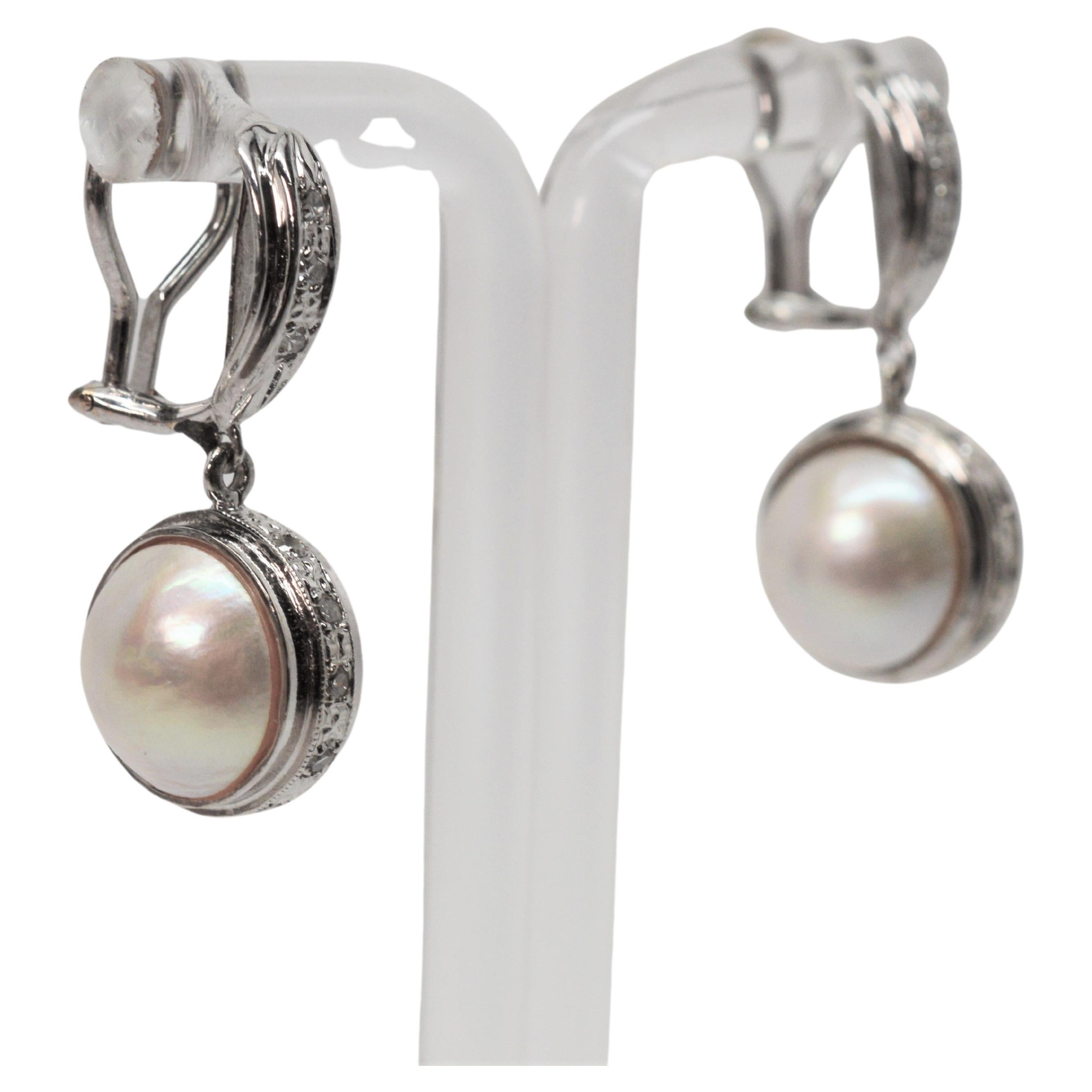 pearl drop earrings with gold accent