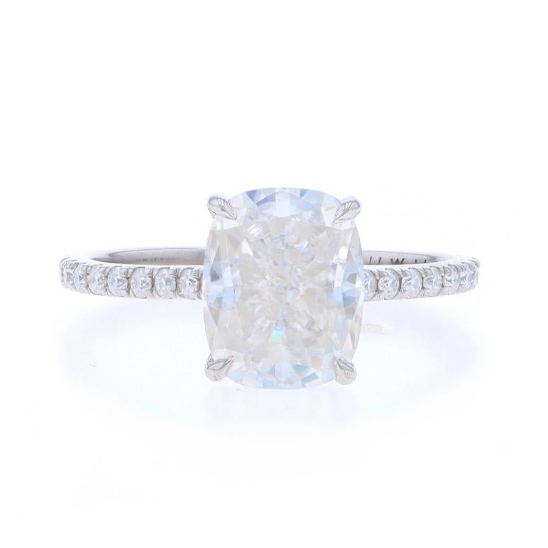 Size: 9
Sizing Fee: Up 1 size for $35 or Down 1/2 a size for $35

Metal Content: 14k White Gold

Stone Information
Natural Moissanite
Carat(s): 6.02ct dew
Cut: Cushion
Color: Clear

Natural Moissanites
Carat(s): .50ctw dew
Cut: Round