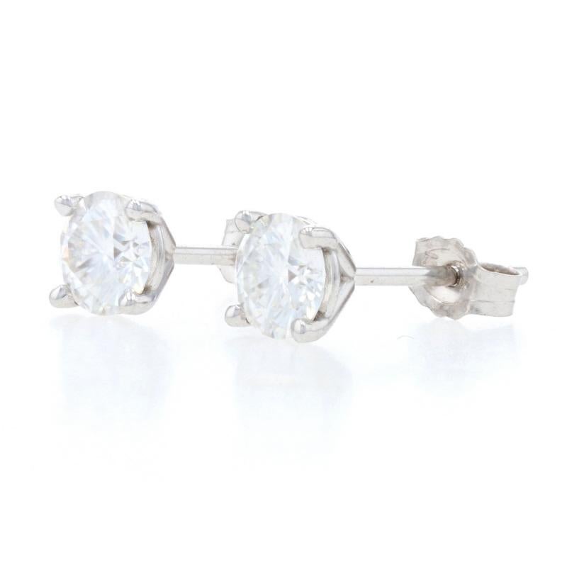 Metal Content: 14k White Gold

Stone Information: 
Genuine Moissanites
Total Carats: .70ctw dew
Cut: Round 
Color: Clear
Diameter: 4.5mm

Style: Stud
Fastening Type: Butterfly Closures

Measurements: 
Diameter: 3/16