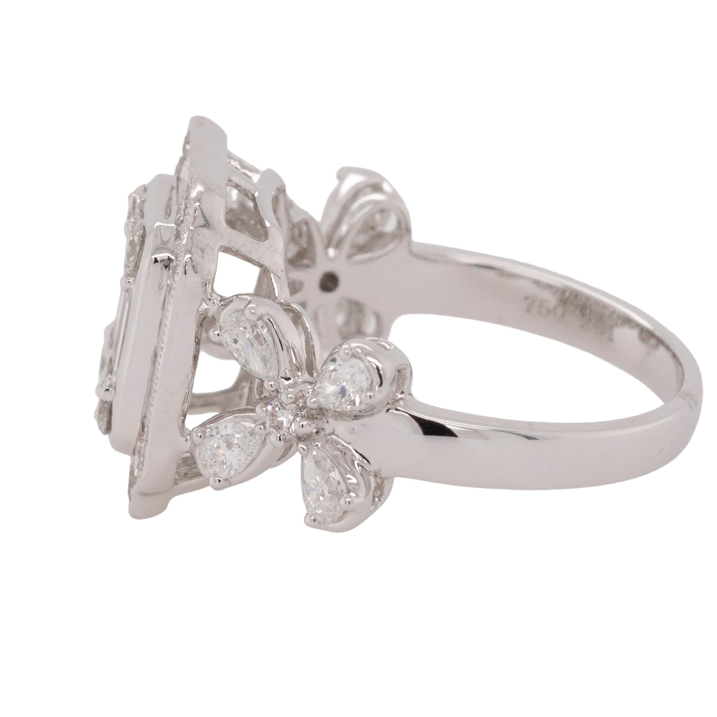 This enchanting 18k white gold ring is a masterful blend of nature-inspired design and luxurious craftsmanship, adorned with a total of 1.84 carats of natural diamonds. The floral-accented motif is brought to life by a delicate arrangement of 0.53