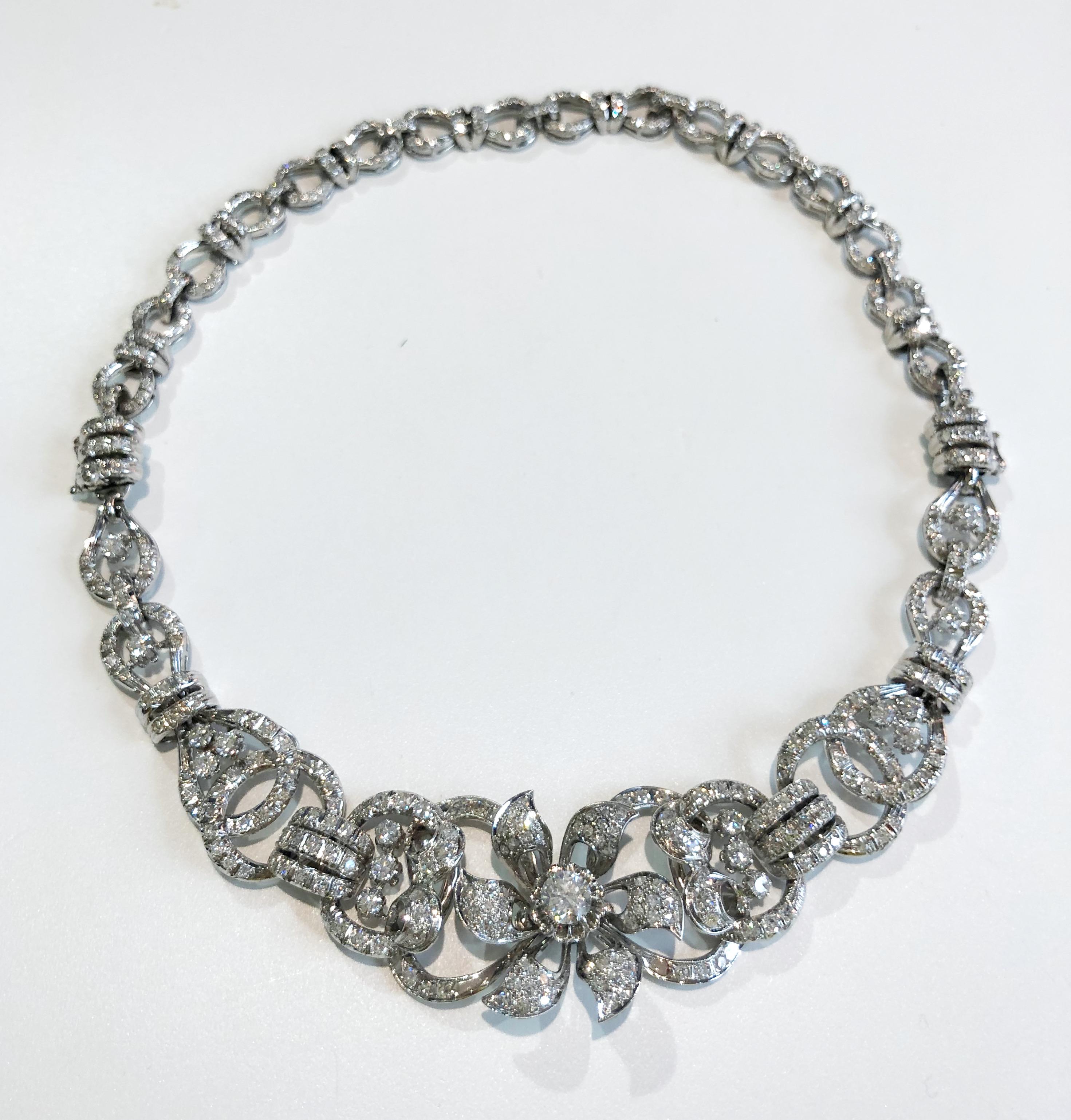 Vintage 18 karat white gold choker necklace which can also be separated into 2 bracelets, with total 6.5 karats of brilliant diamonds, Italy 1950-1960
84 grams
Length 41 cm