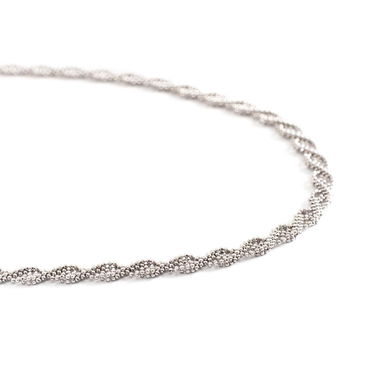 White gold twisted Necklace.
Thickness: 6.50 millimeters.
Total length: approximately 42.00 centimeters.
Gross weight: 18.97 grams.
