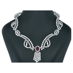 White Gold Necklace Richly Set with Brilliant Cut Diamonds and a Red Ruby