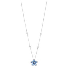 Collar de oro blanco con zafiros azules y diamantes blancos