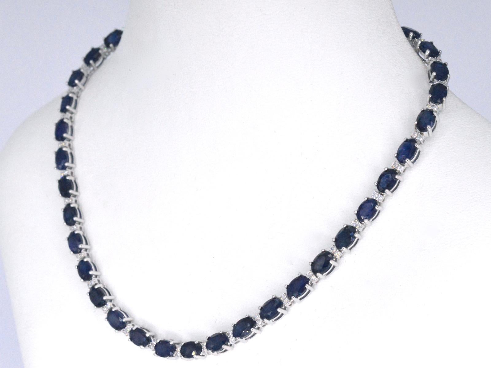Contemporary White Gold Necklace with Diamonds and Sapphire For Sale