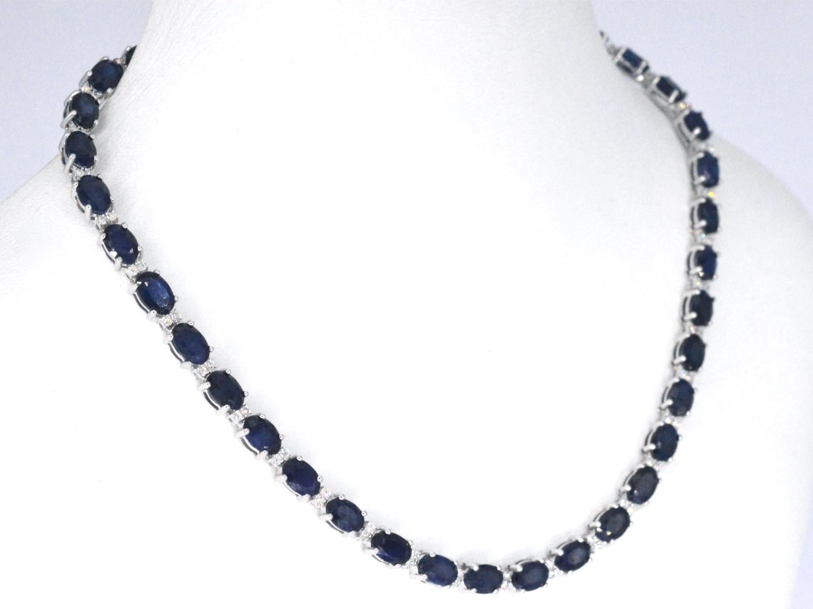 Baguette Cut White Gold Necklace with Diamonds and Sapphire For Sale