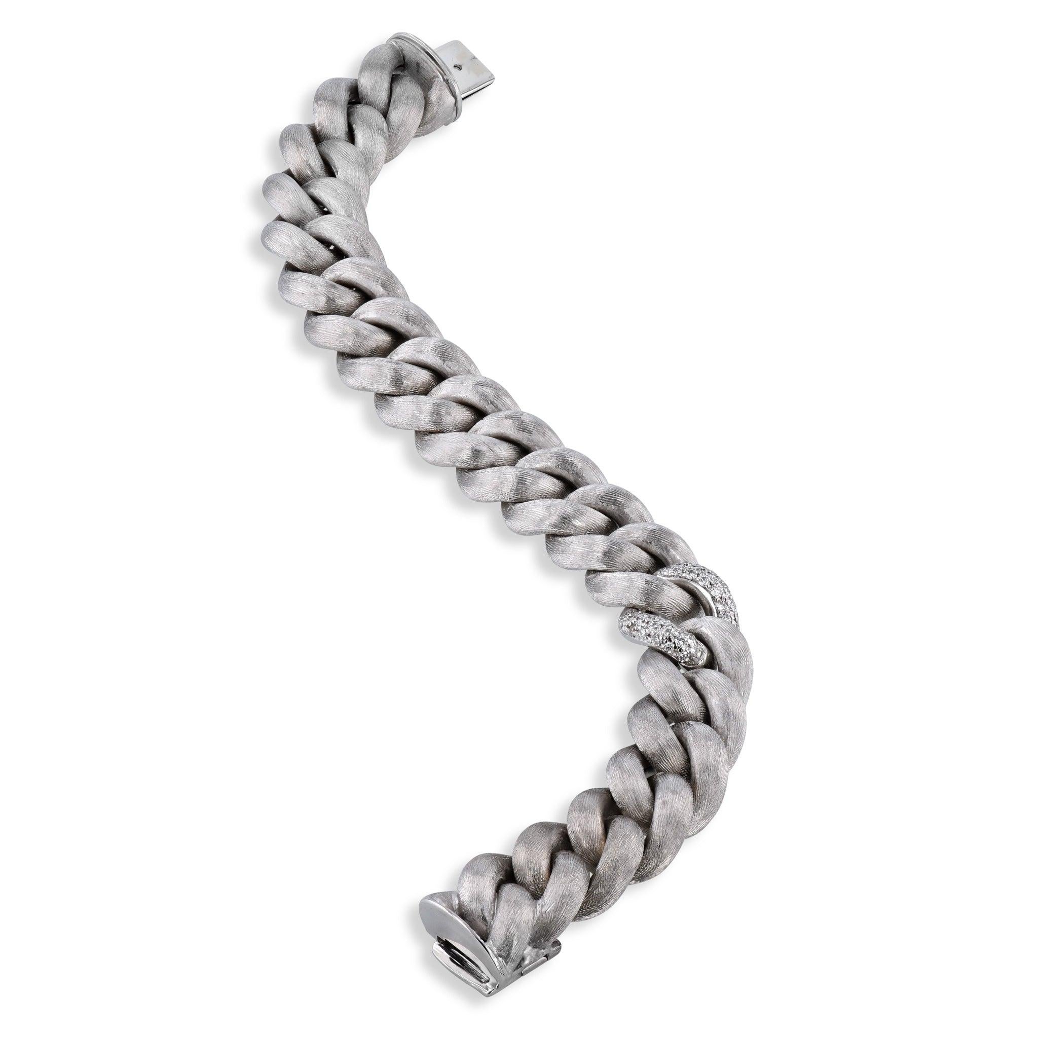 This exquisite White Gold Nicolis Cola Estate Bracelet is crafted from luxurious 18kt. white gold with a magnificent diamond pave of 38 sparkling round brilliant cut diamonds. The radiant Italian made estate bracelet is 7.5 inches long and 14.50mm