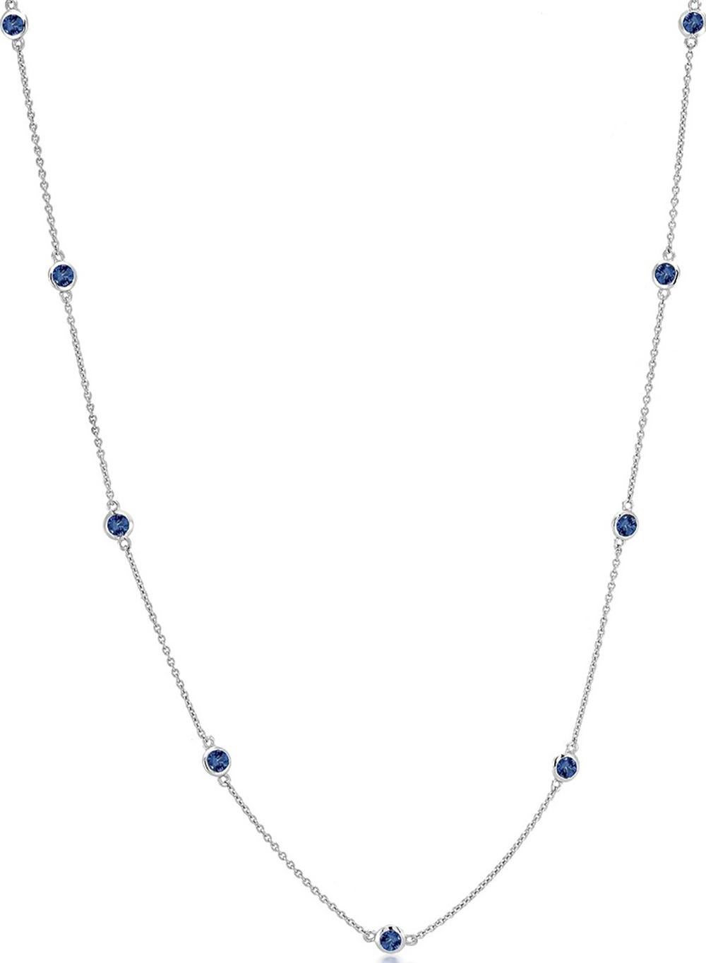 Fourteen karat white gold necklace pendant with nine bezel-set brilliant round bright sapphire 