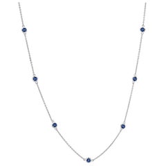 White Gold Nine Blue Sapphire Bezel Set Pendant Necklace Weighing 3 Carat