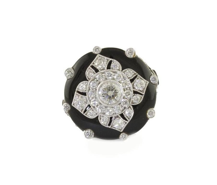 SHIPPING POLICY:
No additional costs will be added to this order.
Shipping costs will be totally covered by the seller (customs duties included).

Fashion ring in 18k white gold mounted with a onyx button adorned with diamonds flower, and diamonds