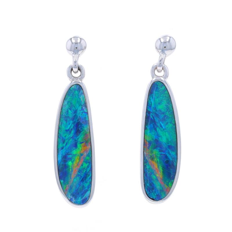 Metal Content: 14k White Gold

Stone Information

Natural Opals
Cut: Doublet

Style: Dangle
Fastening Type: Butterfly Closures

Measurements

Tall: 1 5/32