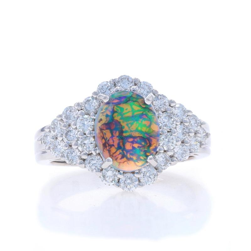Size: 7
Sizing Fee: Up 1 size for $40 or Down 1/2 a size for $40

Metal Content: 14k White Gold

Stone Information

Natural Opal
Carat(s): 1.30ct
Cut: Oval Cabochon
Origin: Australian

Natural Diamonds
Carat(s): 1.25ctw
Cut: Round Brilliant
Color: F