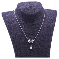 White Gold, Opal, Diamonds and Emerald Necklace.
