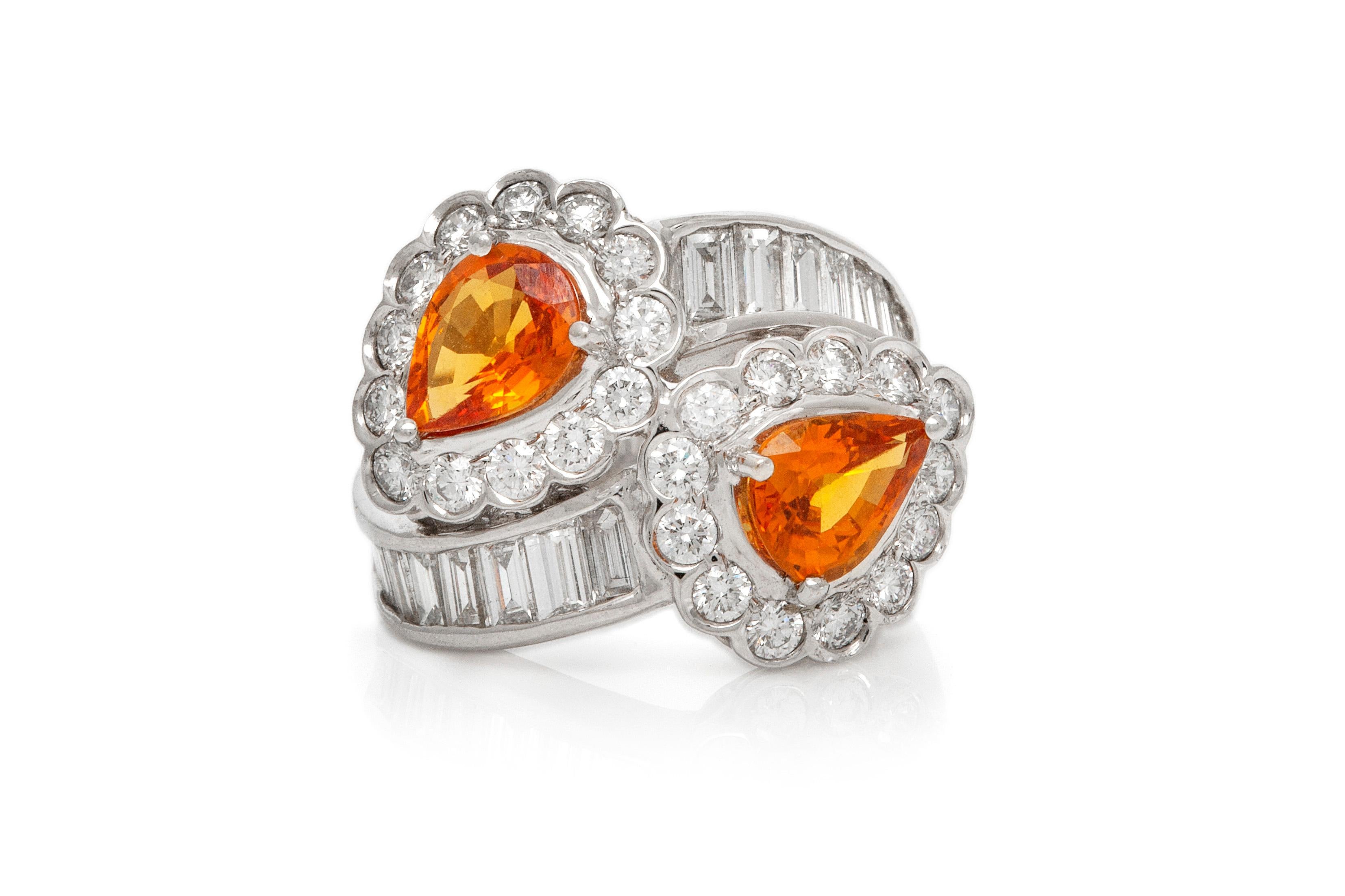 The ring is finely crafted in 18k white gold with orange sapphire weighing approximately total of 2.40 carat and diamonds weighing approximately total of 2.02 carat.
