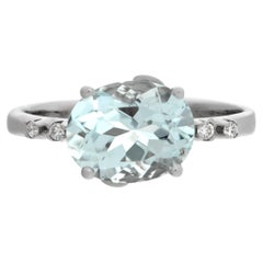 White Gold oval cut Aquamarine ring with diamonds accents