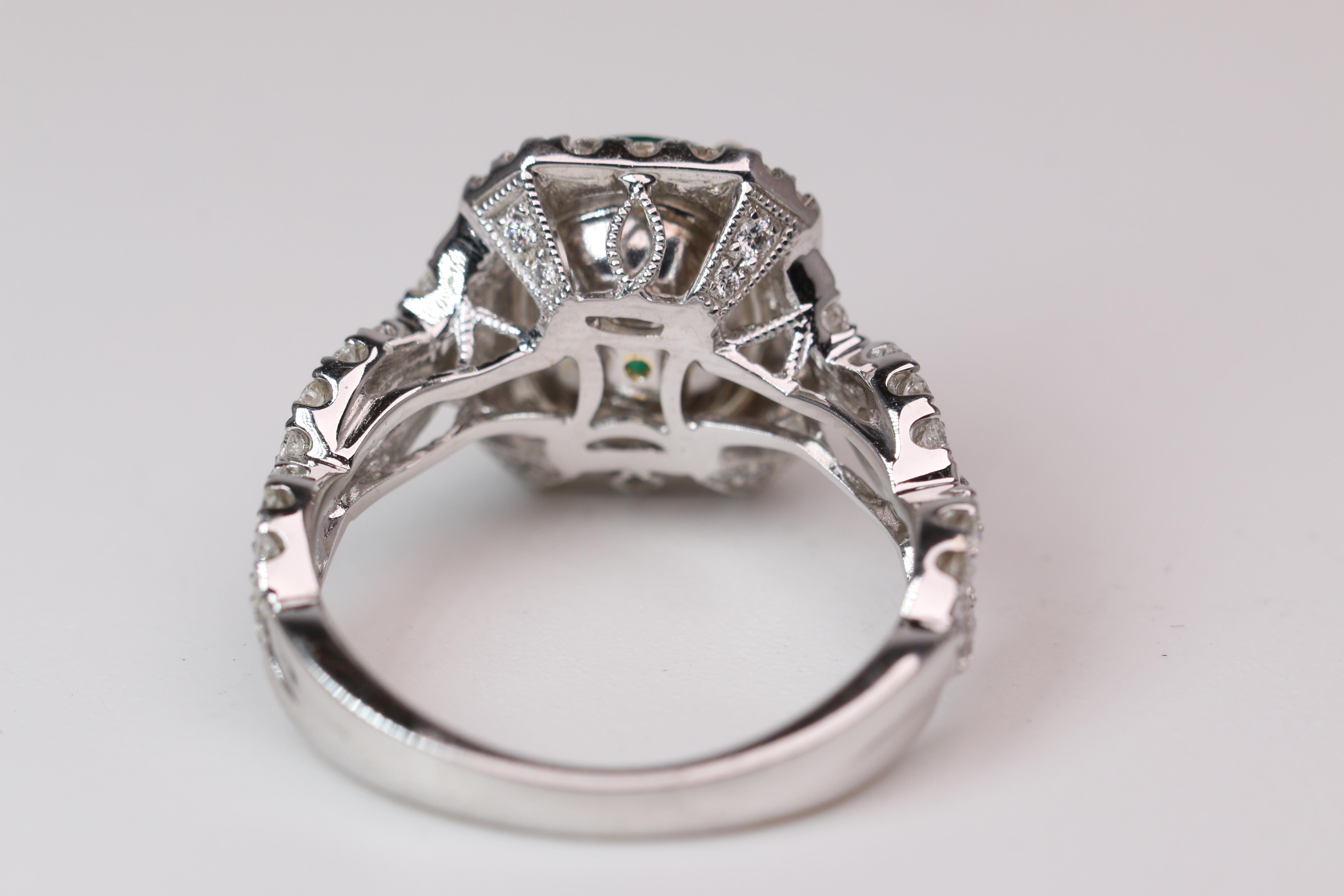 Modern White Gold Oval Cut Emerald Ring