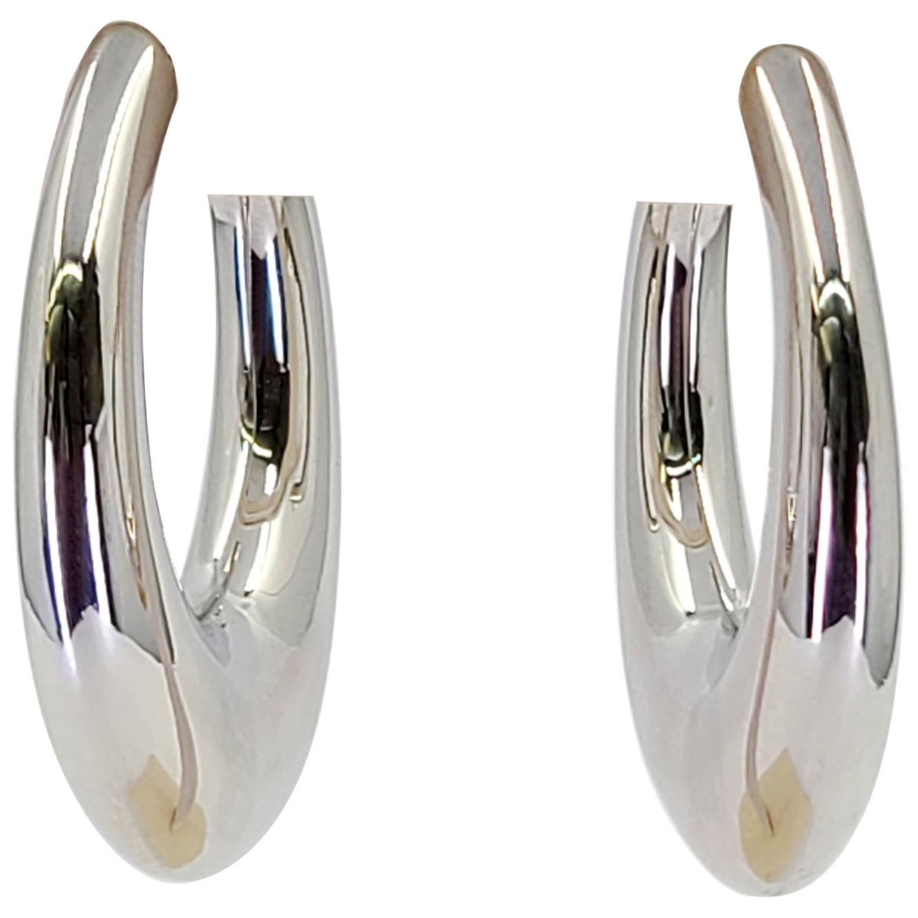 Pendientes de aro ovalados de oro blanco en venta