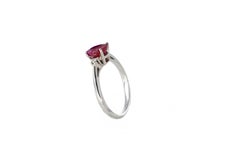 White Gold Oval Ruby Three-Stone Solitaire Ring