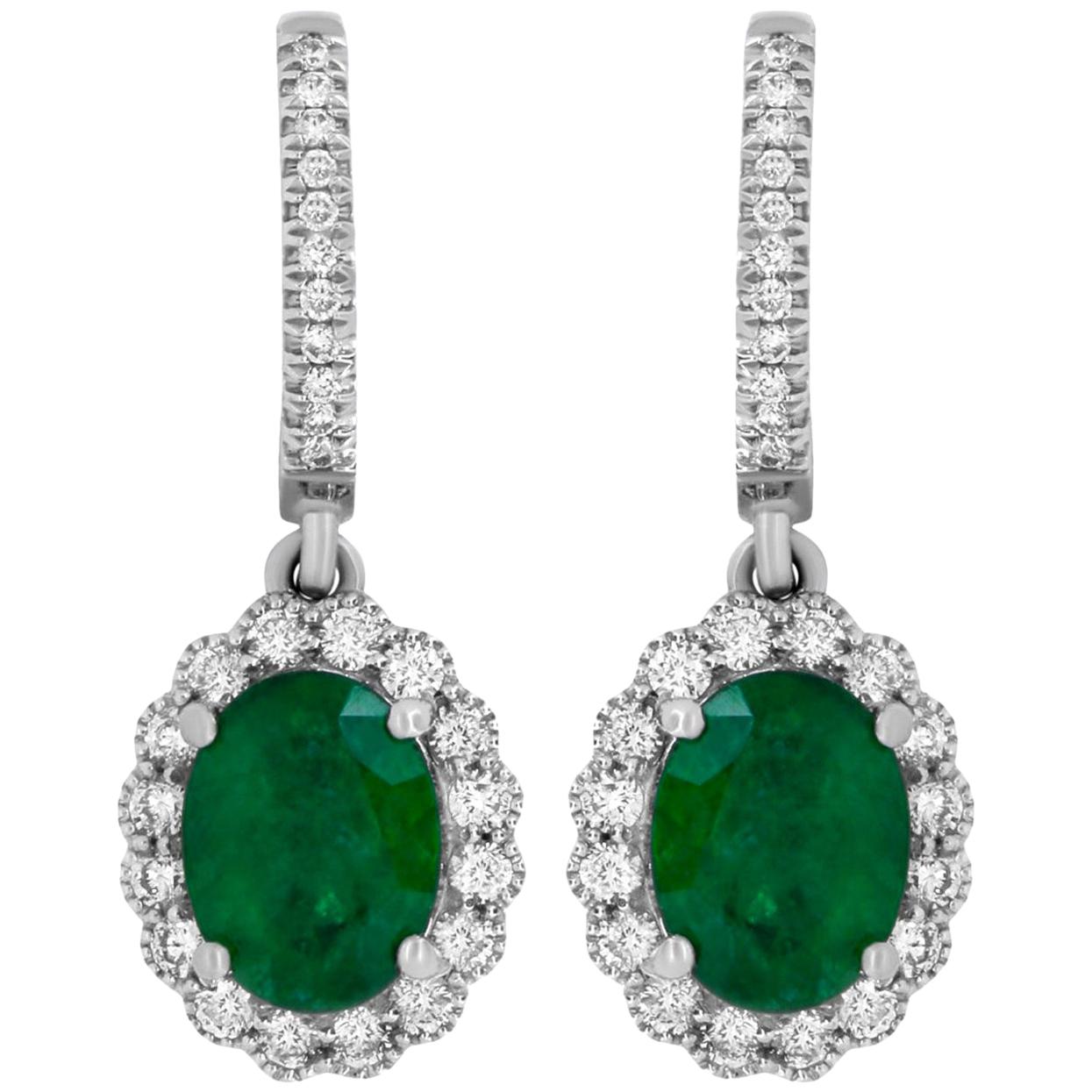 White Gold Oval Shaped Emerald and White Diamond Halo Drop Earring 18 Karat Gold