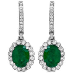 White Gold Oval Shaped Emerald and White Diamond Halo Drop Earring 18 Karat Gold