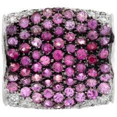 White gold pave diamond and pink sapphire ring