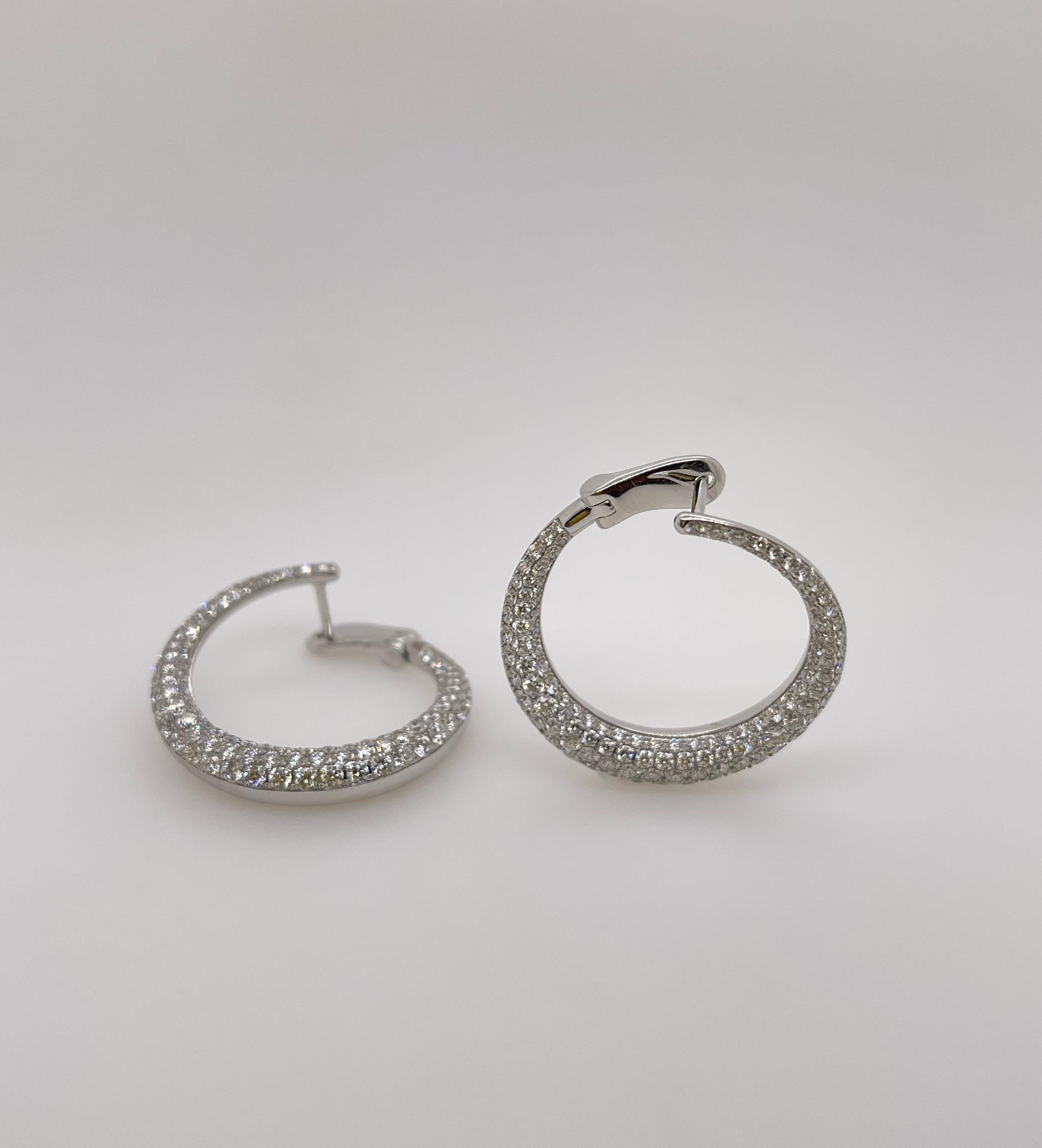 White Gold Pavé Diamond Forward Facing Circular Earrings
18kt white gold 
236 round brilliant diamonds= 2.29ct
