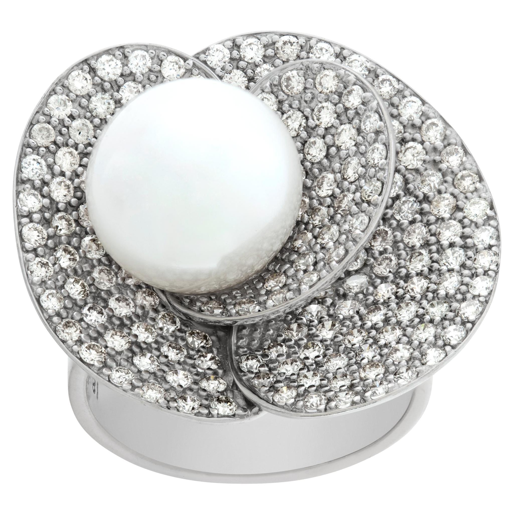 White gold pave diamond petals ring cradling a 11.3 mm cultured pearl For Sale
