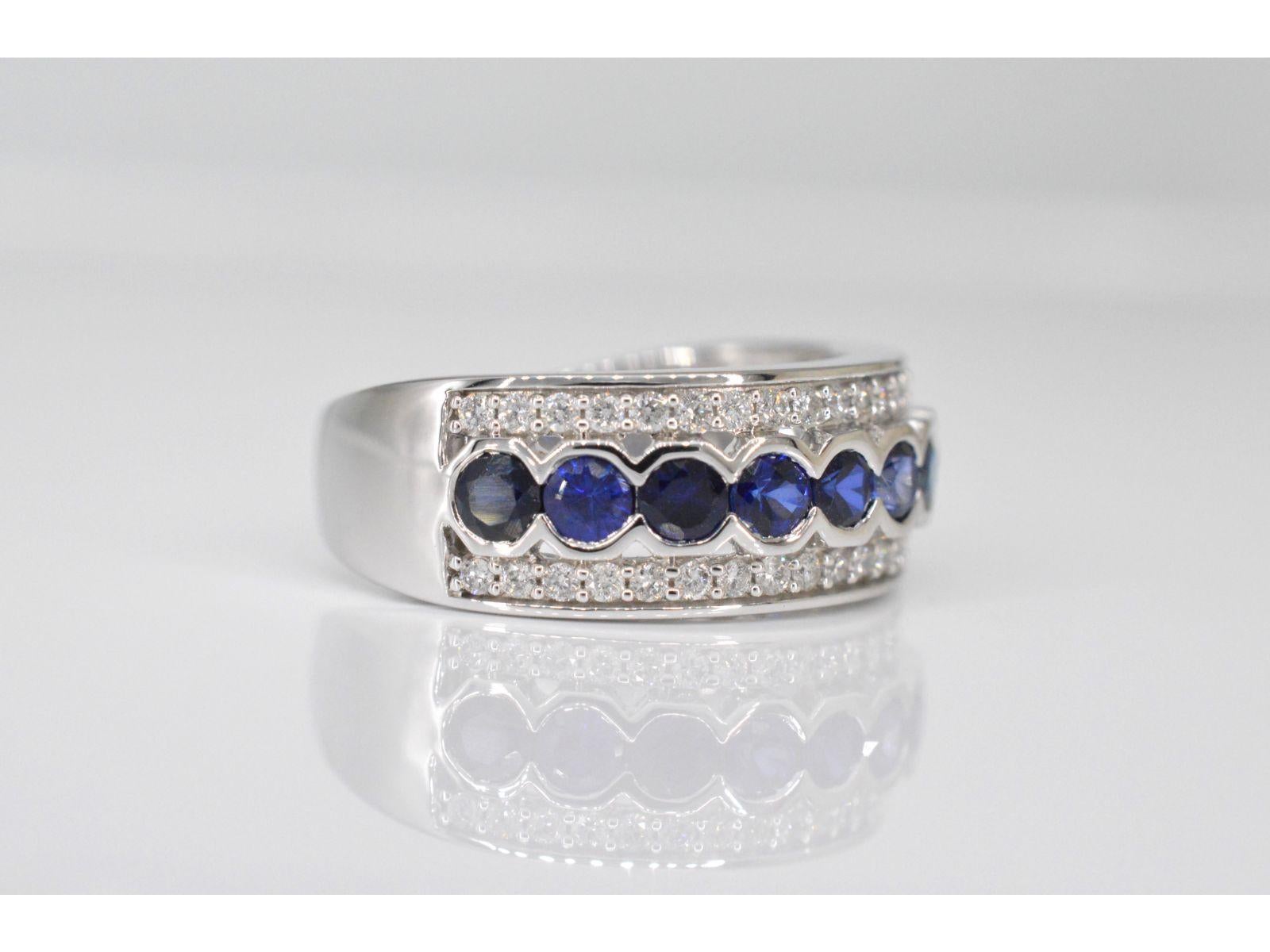 Contemporary White gold pave ring with diamonds and sapphire For Sale