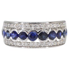 Used White gold pave ring with diamonds and sapphire