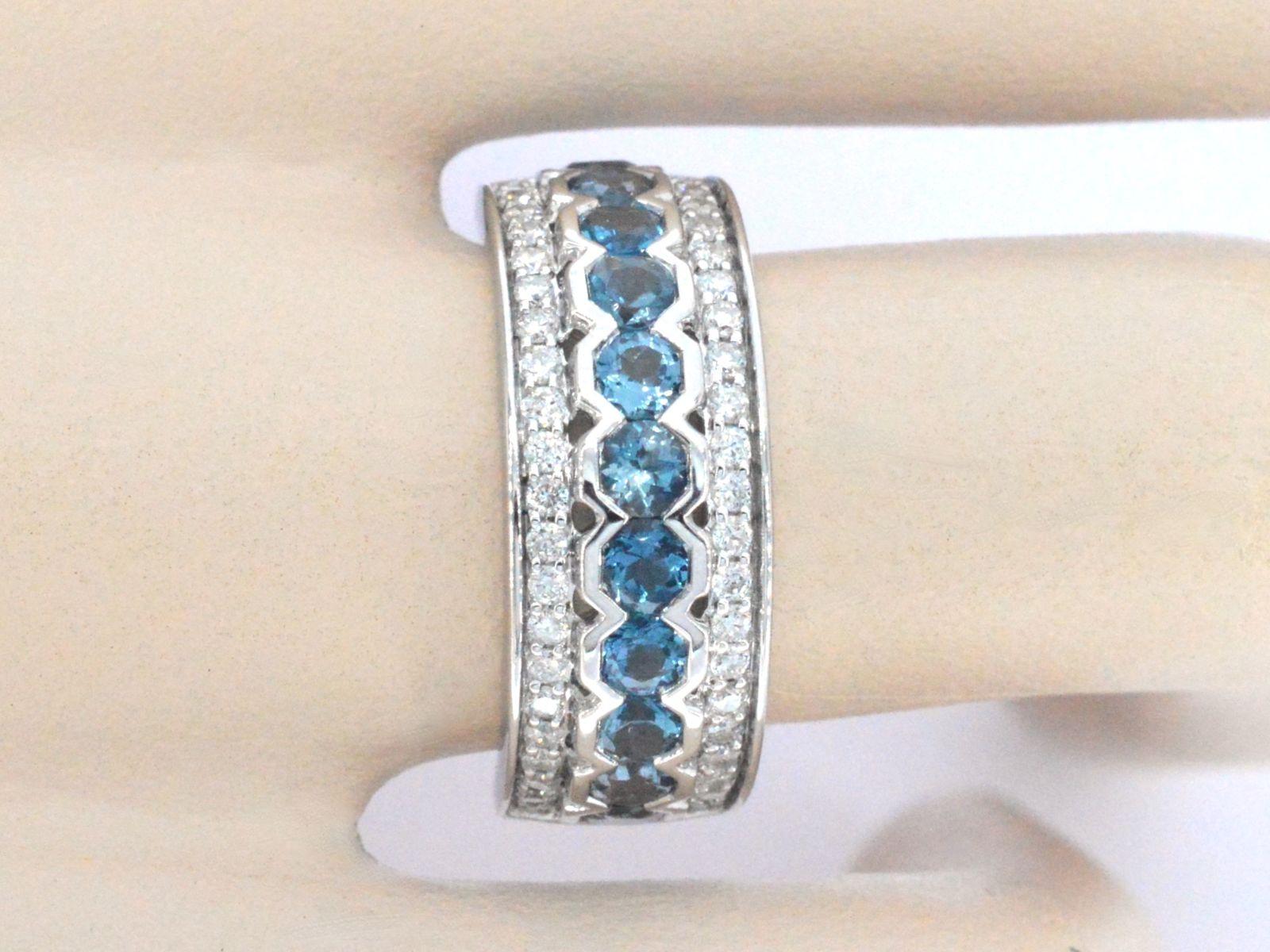 Contemporary White Gold Pave Ring with Diamonds and Topaz For Sale