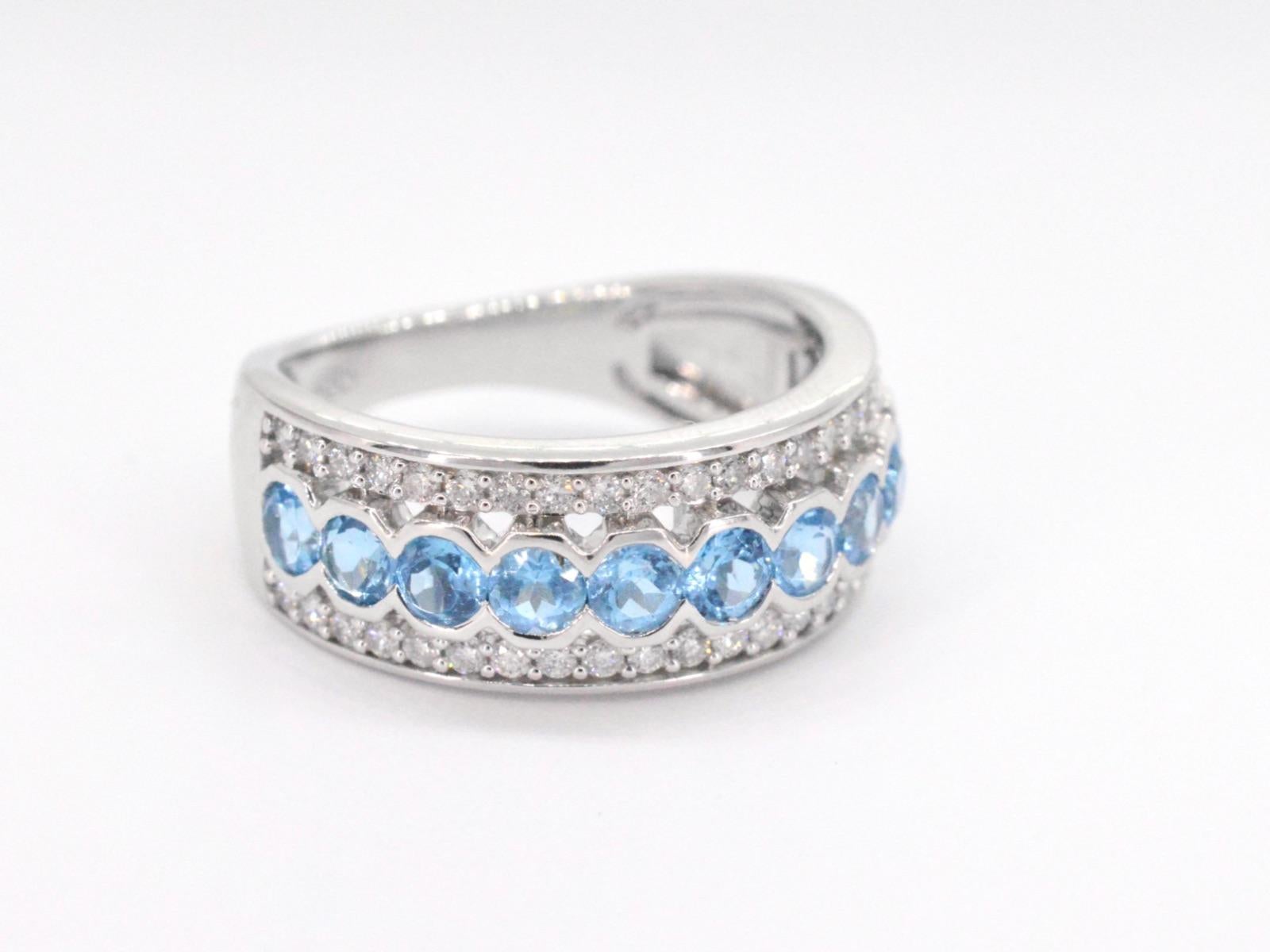 Brilliant Cut White gold pave ring with diamonds and topaz