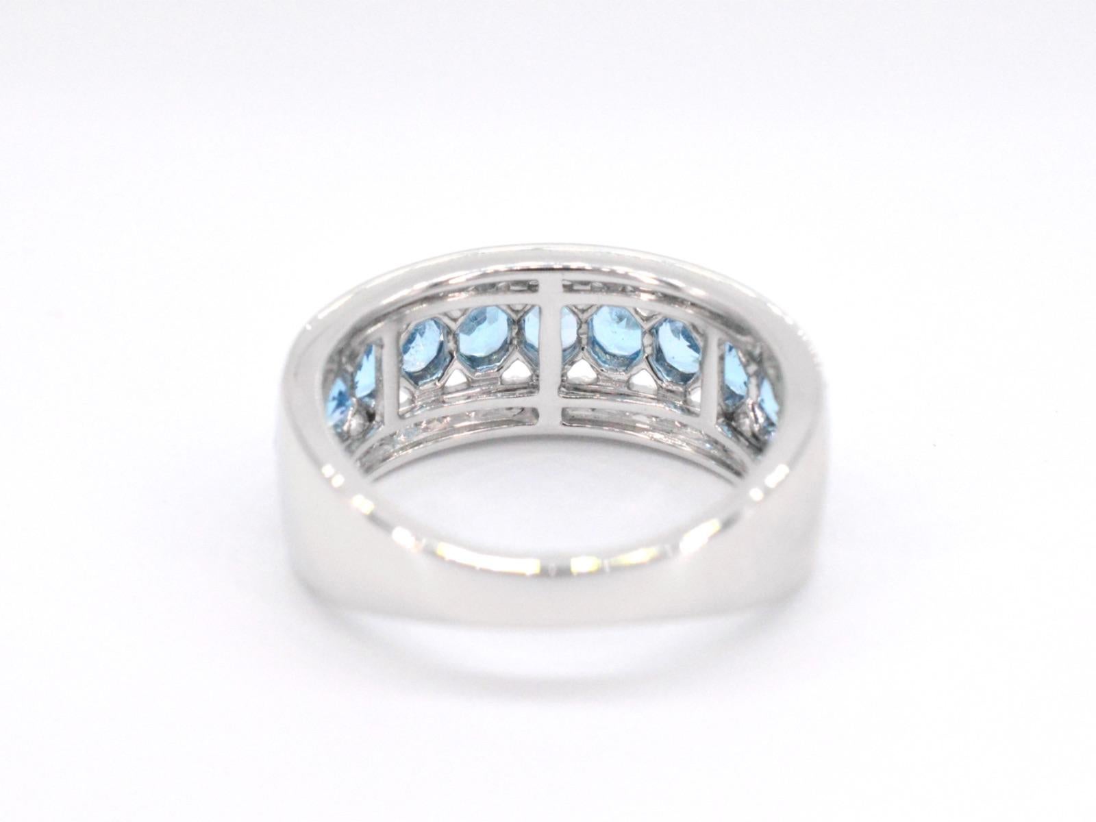 Women's White gold pave ring with diamonds and topaz