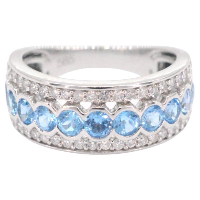 White gold pave ring with diamonds and topaz